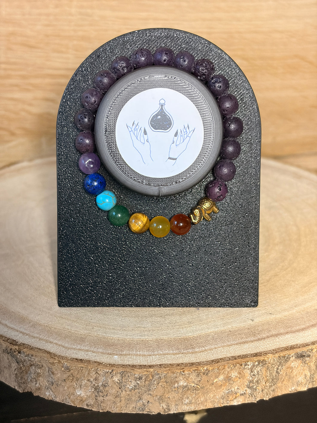 7 Chakra purple lava bead bracelet with elephant charm