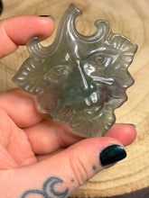 Load image into Gallery viewer, Green man face crystal carving with stand
