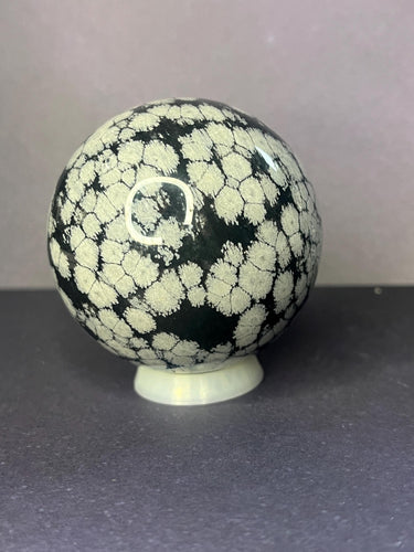 Snowflake obsidian crystal sphere