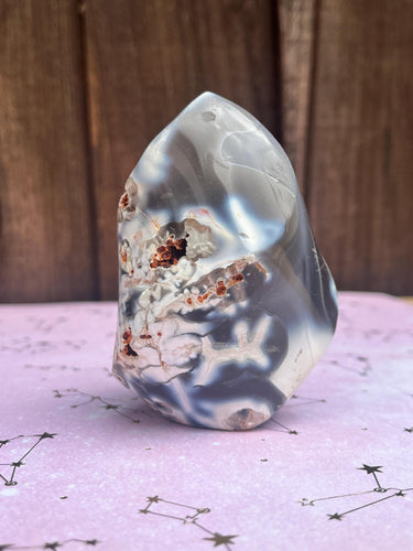 Orca agate crystal flame with interesting flower agate inclusions
