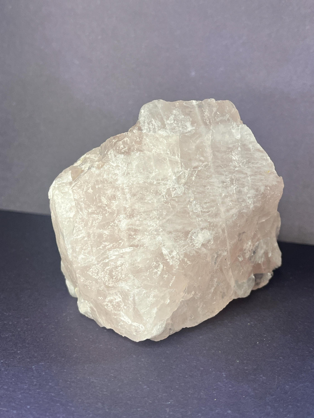 Raw rose quartz crystal specimen