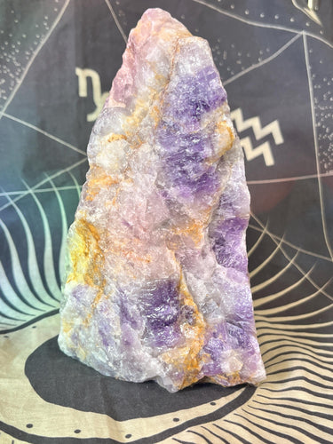 Raw amethyst cut base crystal specimen