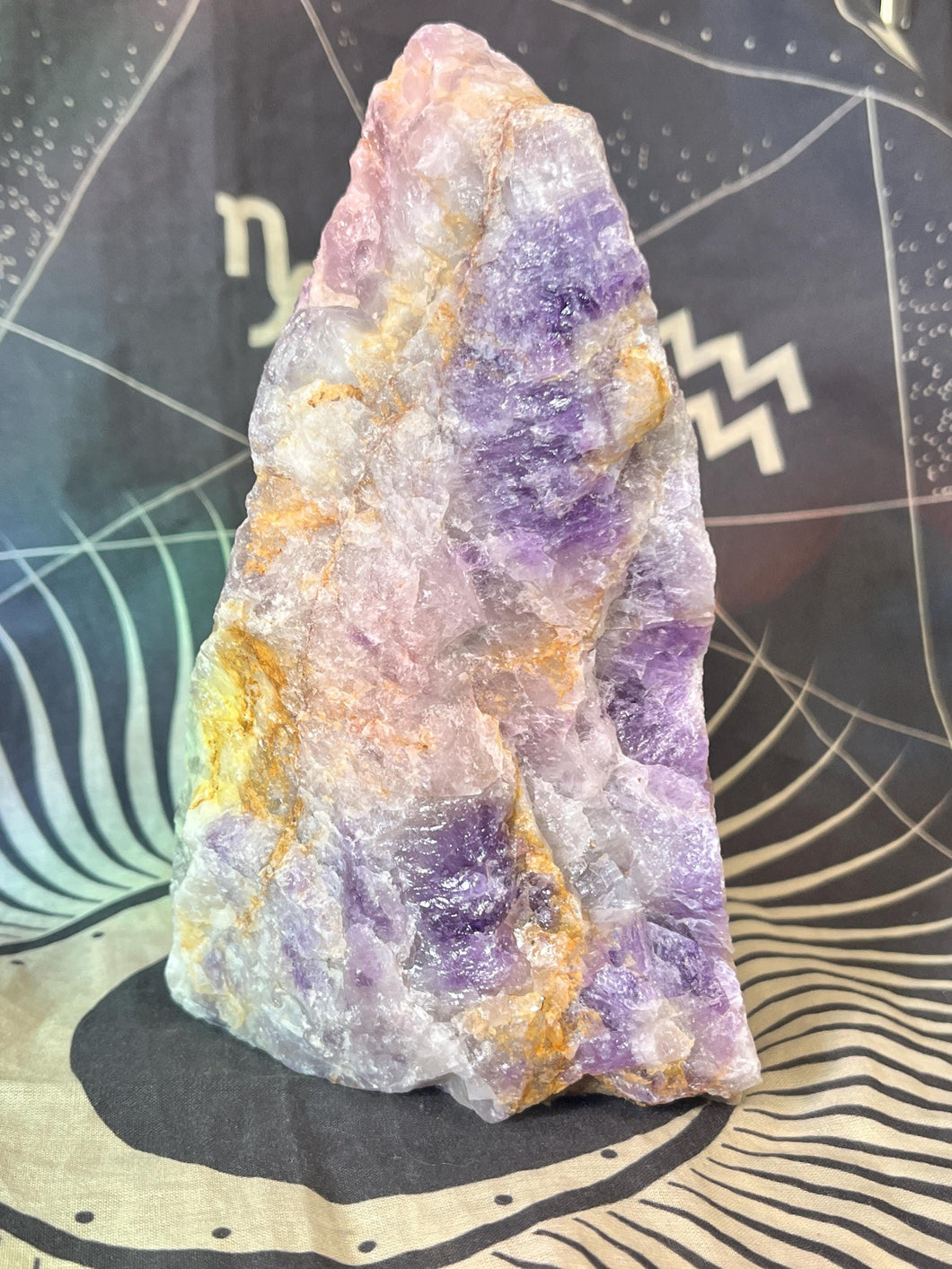 Raw amethyst cut base crystal specimen