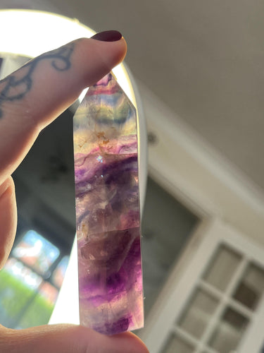 Rainbow fluorite crystal tower