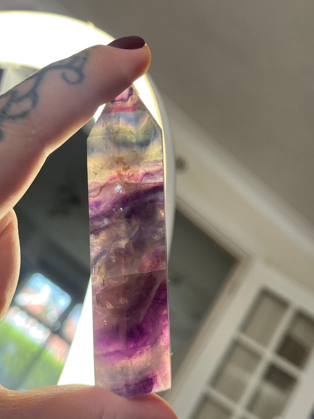 Rainbow fluorite crystal tower