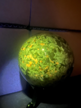 Load image into Gallery viewer, UV reactive yooperlite crystal sphere
