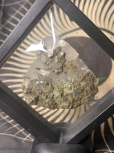 Load image into Gallery viewer, Clear quartz cluster with pyrite peacock ore specimen in black floating frame
