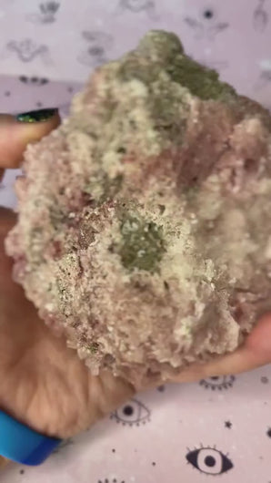 Raw pink halite crystal specimen